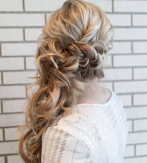 long messy wavy side-swept hair with a bump on top and a braided element plus waves down is amazing