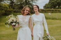 one bride wearing a boho lace crop top and a plain skirt with a front slit, the second bride rocking a plain wedding dress with a slit and a belt