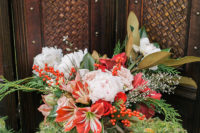 02 The wedding bouquet is in traditional holiday colors and with traditional flowers, and lilies remind of peppermint candies