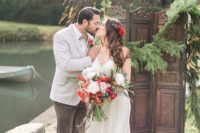 03 The wedding backdrop is a wooden one, decorated with evergreens for a rustic feel