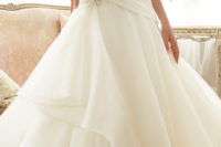 03 sweetheart neckline wedding dress with a beaded embroidered top and a ruffled skirt