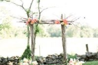 05 outdoor rustic wedding arch with fresh flowers
