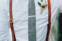 07 white shirt, a grey tie and brown leather suspenders
