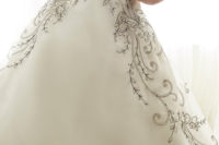 10 black pattern on white wedding dress with a sweetheart neckline