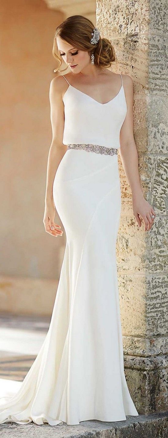spaghetti strap wedding dress with a V-neck and an embellished belt by Martina Liana