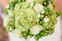 11 wedding bouquet with white roses and greenery touches