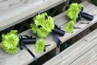 13 greenery flower boutonnieres with black wraps