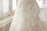 13 ivory lace and beading wedding dress will keep you covered on the neckline