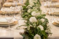 14 greenery table runner with small white flowers