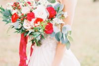14 red ranunculus will look outstanding in your bridal bouquet