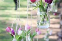 15 hanging jars with tulips that are truly spring flowers
