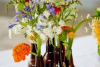 16 beer bottle vases with wildflowers
