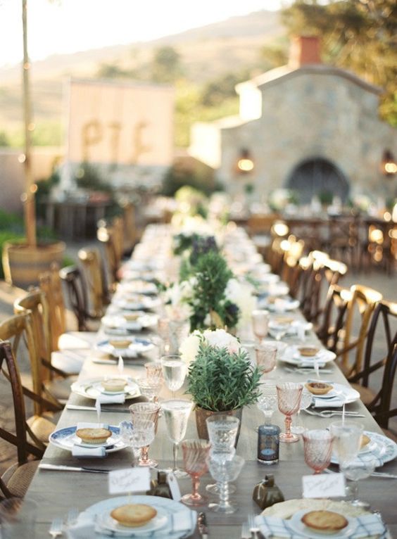 simple table decor with potted greenery and candles