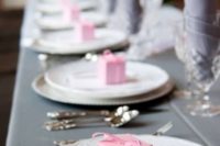23 grey tablecloth and napkins, pink gift boxes