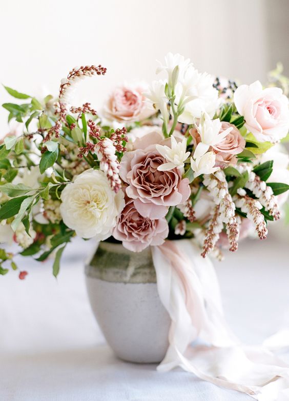 fresh spring floral centerpiece in blush and pastels