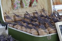 26 lavender soap favors in a vintage suitcase