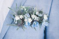 26 light blue suit, a patterned shirt and a lush blue flower and thistle boutonniere