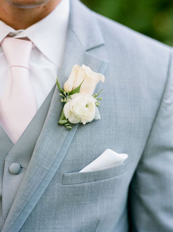 light grey suit and a vest, a blush tie