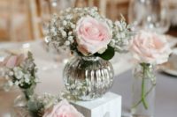 29 mercury glass vases with blush roses and baby’s breath