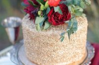 30 gold wedding cake with greenery and red roses