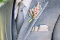 31 light grey suit with a vest and tie, blush boutonniere