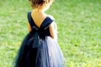31 navy dress with a V back and a layered tulle skirt