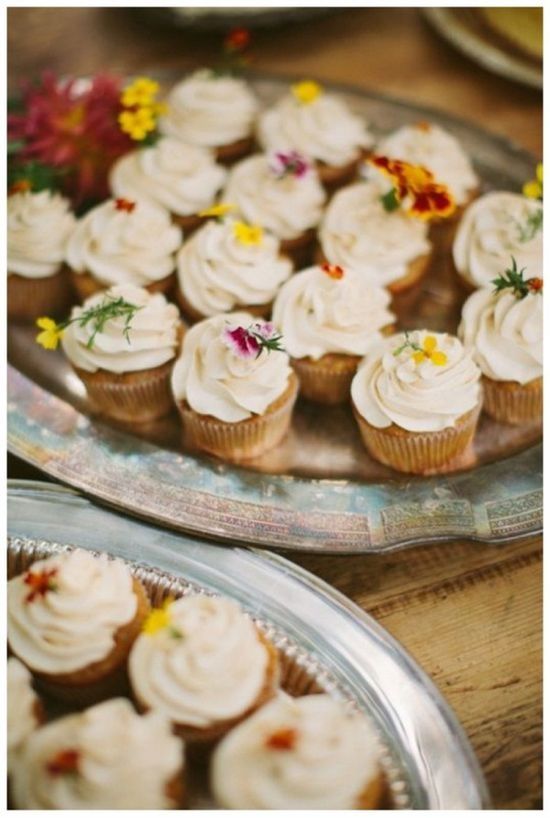 cupcakes topped with wildflowers is a great idea