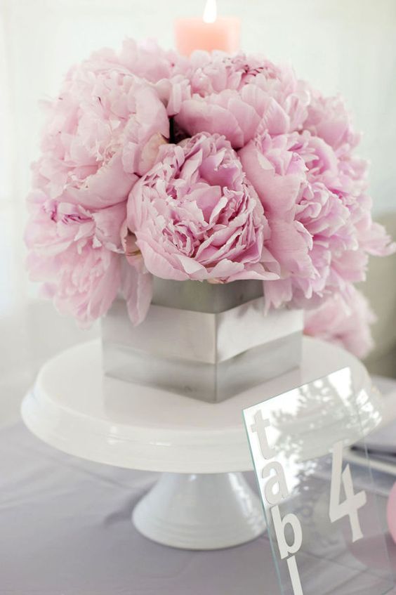 pink peonies in a grey box with ribbon