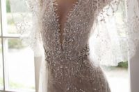36 glamorous drape sleeve silver embellished wedding dress by Berta Bridals