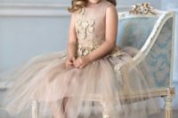 37 powder-colored dress with gold lace flower appliques and a layered tulle skirt
