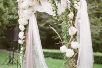 37 rustic arch with tulle and white and blush hydrangeas