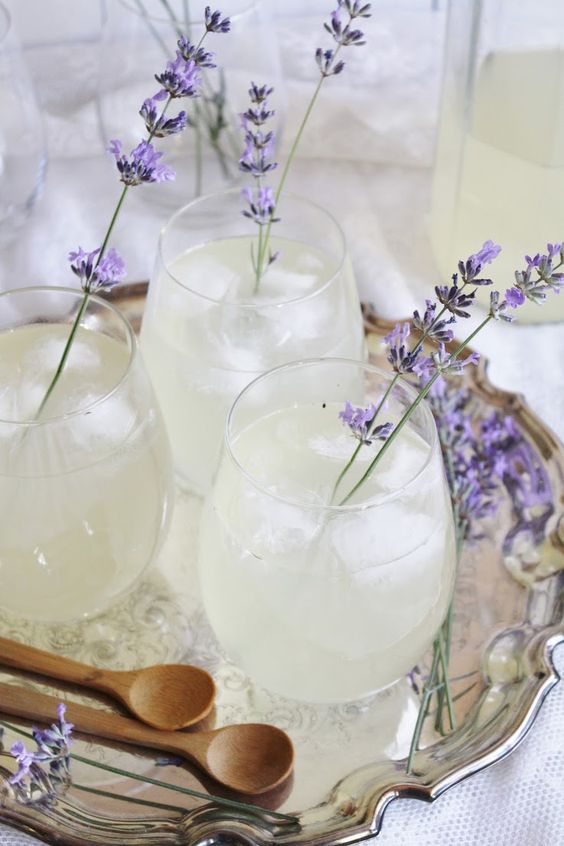 lavender lemonade presentation on silver trays with strong color lavender in drinks