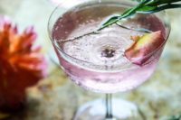 47 rose and tarragon gin lemonade with petals and rosemary