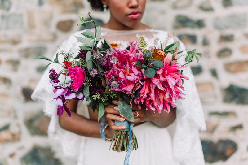 The bridal bouquet is super colorful and textural, just like the rest of the shoot