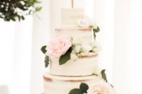 02 semi naked three-tiered wedding cake with fresh flowers and a calligraphy topper