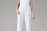 02 strapless white pantsuit with black heels and a statement necklace