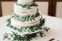 04 spring-inspired semi naked wedding cake with fresh greenery