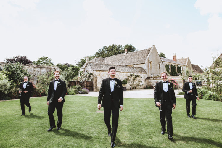 The groom and groomsmen went conservative with classical black tuxedos and bow ties