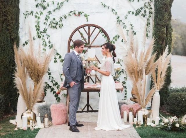 marble backdrop and pampas grass embellishments