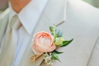 06 neutral groom’s look with a peach-colored boutonniere