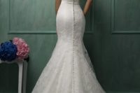 07 mermaid lace wedding dress with an illusion back and a row of buttons looks flawless