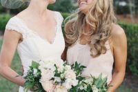 09 the bride in an ivory V-neck dress and her maid of honor in off-white