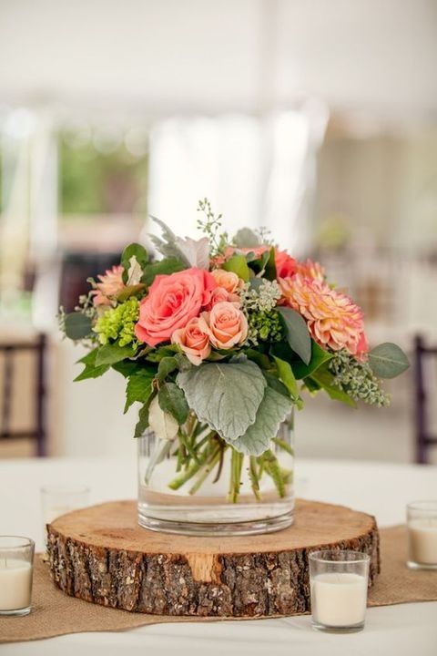 wood slice with a vase with bold florals