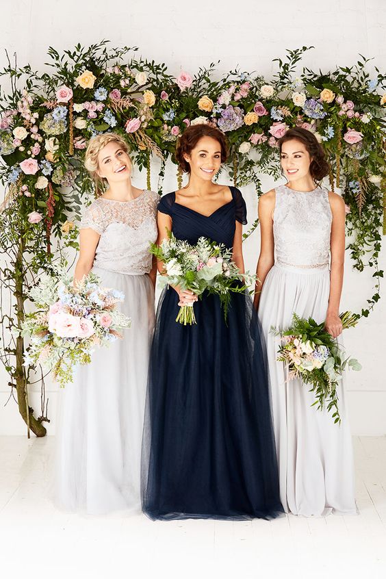 different lace tops and maxi skirts of the same shade for bridesmaids