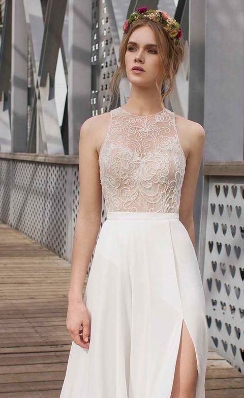 lace halter neckline wedding dress with a plain skirt and a thigh-high slit