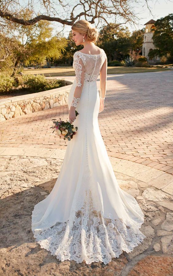 romantic lace bodice dress with an illusion back and sleeves with buttons