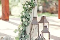 11 ceremony chuppah decor with eucalyptus and various florals