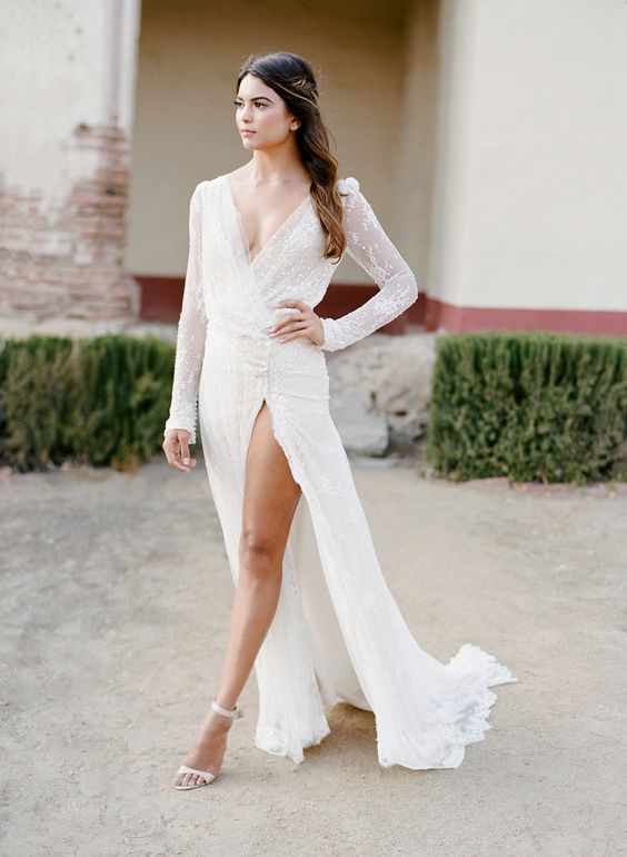 sexy high slit wedding dress with a deep V-neckline and long sleeves