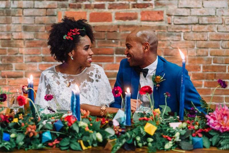 The groom rocked a bold blue suit with a black bow tie, so chic