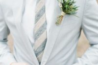 12 dove grey groom’s suit with a striped tie
